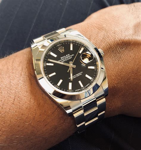 golden rolex hand wrist|rolex datejust 36 vs 41.